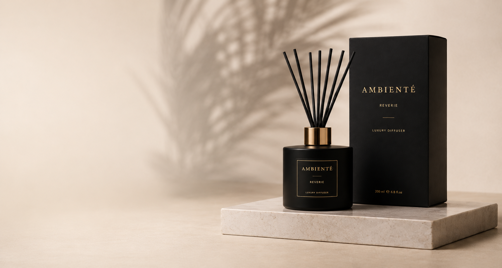 AMBIENTÉ Reverie luxury diffuser bottle and box on a stone tray